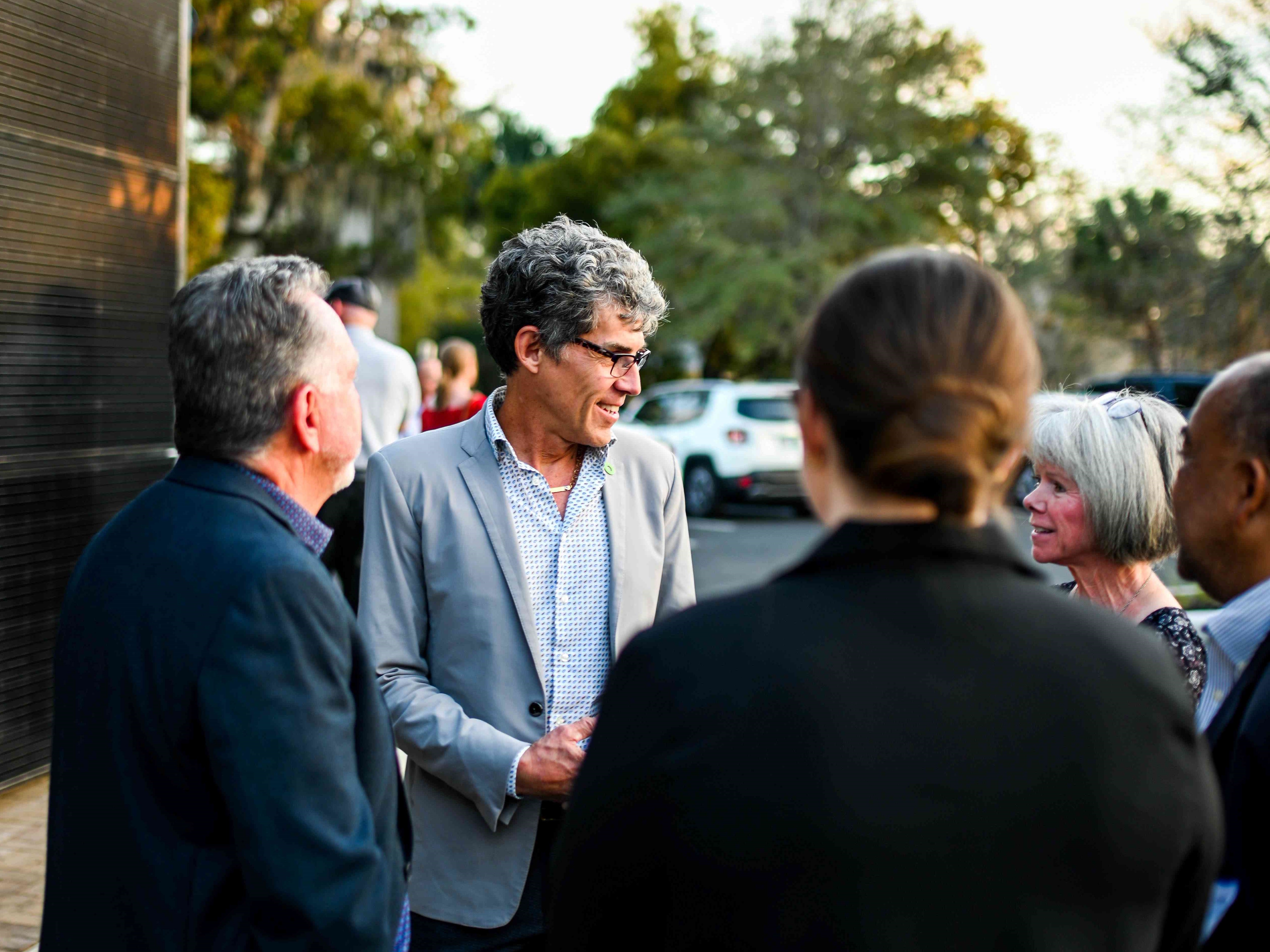 Ken Laroe, CEO of Climate First Bancorp and Executive Chairman of Climate First Bank, at the grand opening of the bank's Winter Park location.